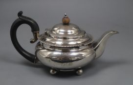 A George IV silver squat teapot by Pearce & Burrows, London, 1827, gross 12.5 oz.CONDITION: engraved