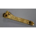 A modern 9ct gold mounted gilt metal cigar cutter, hallmarked for London, 1977, 14.4cm.CONDITION: