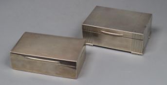 Two silver mounted cigarette boxes, including late 1950's, largest 14.1cm, gross 31 oz.CONDITION: