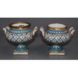 A pair of Continental porcelain urns, one with cover, height 11.5cm excluding coverCONDITION: One