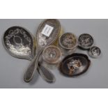 An early 20th century matched seven piece tortoiseshell and silver mounted dressing table set,