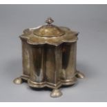 A George V silver tea caddy, of lobed form,on shell feet, Pairpoint Brothers, London, 1911, 12.