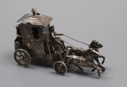 An early 20th century German silver miniature group of a coach and horses, with hinged lid, London