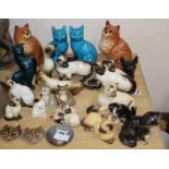 A collection of assorted pottery cats to include Beswick, Poole and WadeCONDITION: Nine of the
