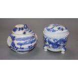Two Chinese blue and white 'dragon' jars and coversCONDITION: The squat jar and cover has two