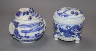 Two Chinese blue and white 'dragon' jars and coversCONDITION: The squat jar and cover has two