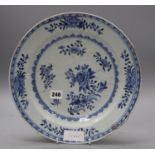 An 18th century Chinese blue and white dish, diameter 32cmCONDITION: Several chips to the rim