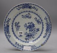 An 18th century Chinese blue and white dish, diameter 32cmCONDITION: Several chips to the rim