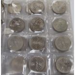 A collection of mainly 20th century Uk and World coins in two albums and loose including Five