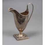 A George III engraved silver helmet shaped cream jug, Peter & Ann Bateman, London, 1793, 14.3cm, 3.5