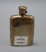 A sterling hip flask, with engraved monogram, 12.2cm, 3.5oz.CONDITION: Dented and scratched.