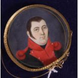 A circular miniature of a gentleman in red