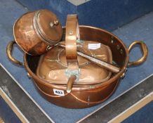 A Victorian copper two handled preserve pan, a copper lidded saucepan and four other pieces
