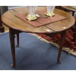 A mid 18th century walnut drop leaf table, W.140cm extended, D.104cm, H.71cm