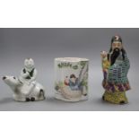 A Chinese enamelled brush pot and two Chinese porcelain figures, tallest 20cm