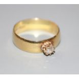 A modern 18ct gold and solitaire diamond set ring, size Q, gross 4.6 grams.CONDITION: Stone is
