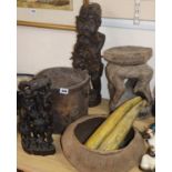 A collection of tribal carvings, stool etc