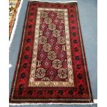 An Afghan rug, 147 x 77cm