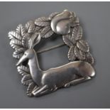 A post 1945 Georg Jensen 925 square 'recumbent deer and squirrel' brooch, design no. 318, 37mm, 15