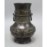 A 17th/18th century Chinese bronze archaic style vase, height 21.5cmCONDITION: There are several