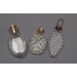 Three assorted 19th century cut glass scent bottles, including one with French yellow metal mount,