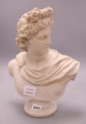 A resin 'marble' bust of Apollo, height 34cm