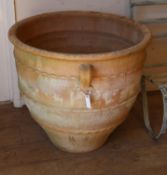 Pots and Pithoi Ltd. A pair of large circular terracotta rebachia (loop handle), diameter