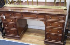 A Victorian mahogany pedestal desk, W.136cm, D.57cm, H.76cm