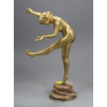 An Art Deco style bronze figure of a nude female juggler, signed to the base, C J R Colinet, overall