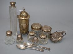 A George V silver muffineer, 3.5oz, 15.5cm, a late Victorian embossed silver mustard pot and ten