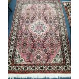 A Persian rug, 160 x 105cm