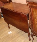 A mid Victorian mahogany drop leaf dining table, L.132cm extended