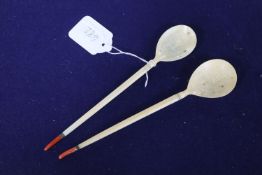 Two Ottoman walrus ivory and coral mounted sherbert spoons, Turkey, 19th century, Condition - one