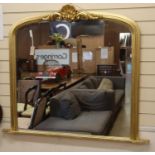 A Victorian style gilt framed overmantel mirror, W.124cm, H.105cm