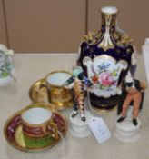 A Royal Crown Derby vase, a pair of Neapolitan Commedia dell'Arte figures and two Vienna style