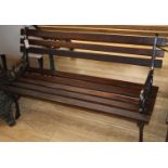 A Victorian style black painted cast metal garden bench, W.120cm, D.48cm, H.66cm