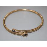 A modern 9ct gold, hematite and diamond mounted steel sprung necklet, gross weight 48.9 grams.