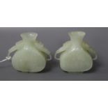 A pair of miniature jade vases, height 6cm