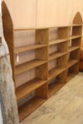 A large Gothic style oak open bookcase, L.260cm, D.26cm, H.158cm