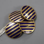A pair of 18ct and enamel disc cufflinks, diameter 14mm, gross 8.3 grams.CONDITION: Nicks and