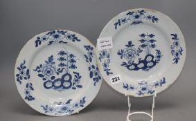 A pair of 18th century Dutch delft blue and white dishes, diameter 23cmCONDITION: Both have