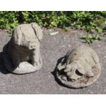 Two reconstituted stone garden pig ornaments, larger 35cm high