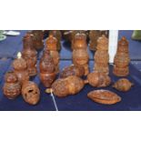 A group of 19th century carved coquilla nut containers, and pepper pots, tallest 12cm 5 - 11.5cm