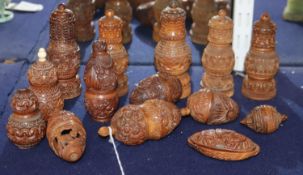 A group of 19th century carved coquilla nut containers, and pepper pots, tallest 12cm 5 - 11.5cm