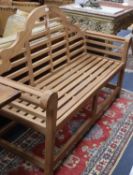 A teak Lutyens-style garden bench, W.168cm, D.50cm, H.105cmCONDITION: New condition