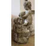 A reconstituted stone garden statue of two cherubs, H.76cm