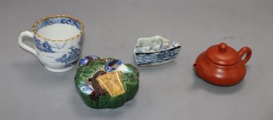 A group of Chinese porcelain including a Redware teapot, a blue and white tea cup and two other