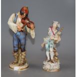 A Meissen figure of a fiddler, model R147 and another porcelain figure, tallest 24cmCONDITION: The