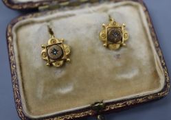 A pair of Victorian yellow metal and diamond chip set quatrefoil shaped earrings, 9mm, gross 1.3