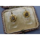 A pair of Victorian yellow metal and diamond chip set quatrefoil shaped earrings, 9mm, gross 1.3